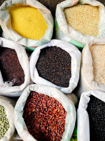 Sacks of healthy legumes and grains.